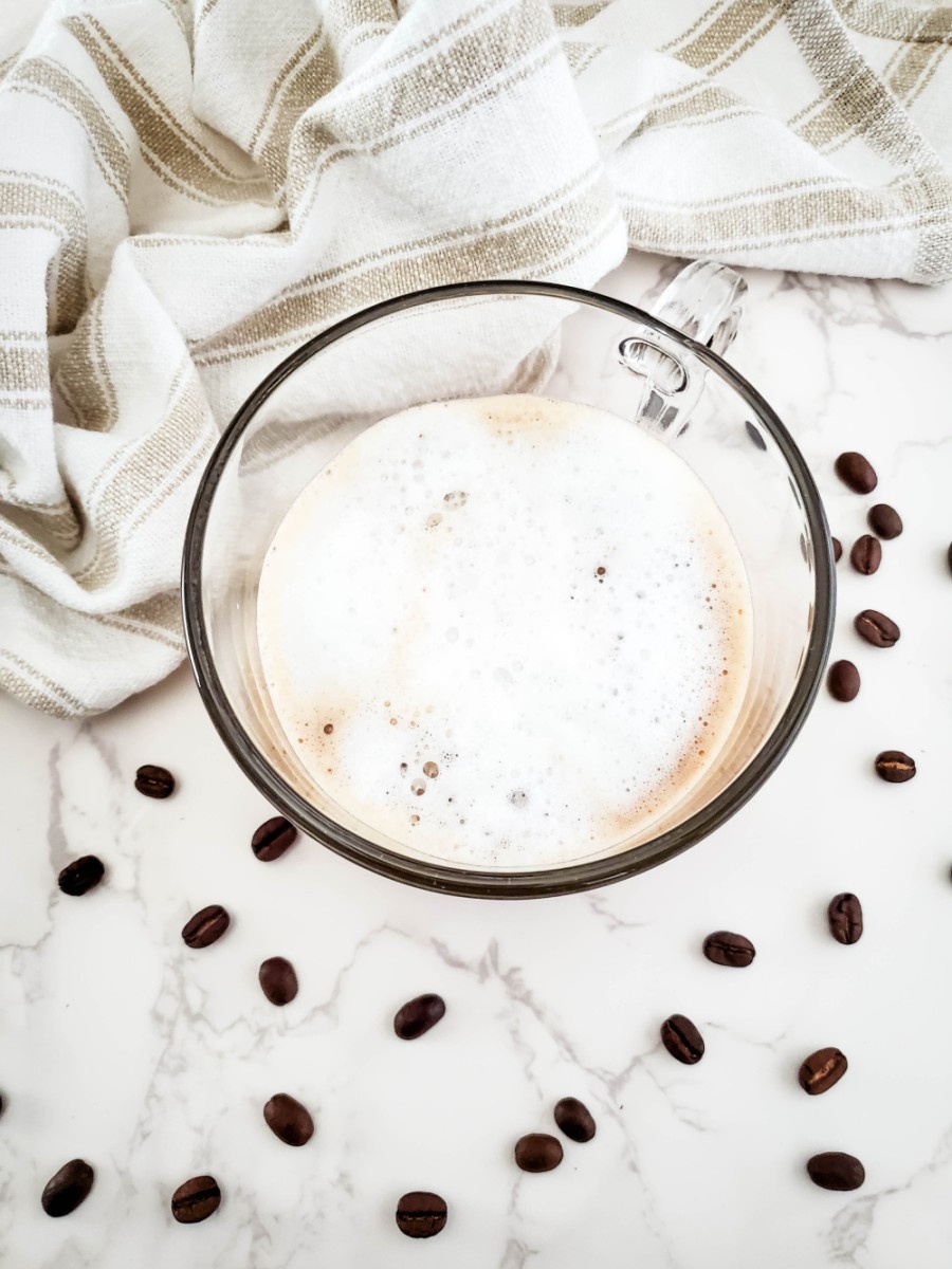 Caramel apple latte with vanilla showing the foam made from milk