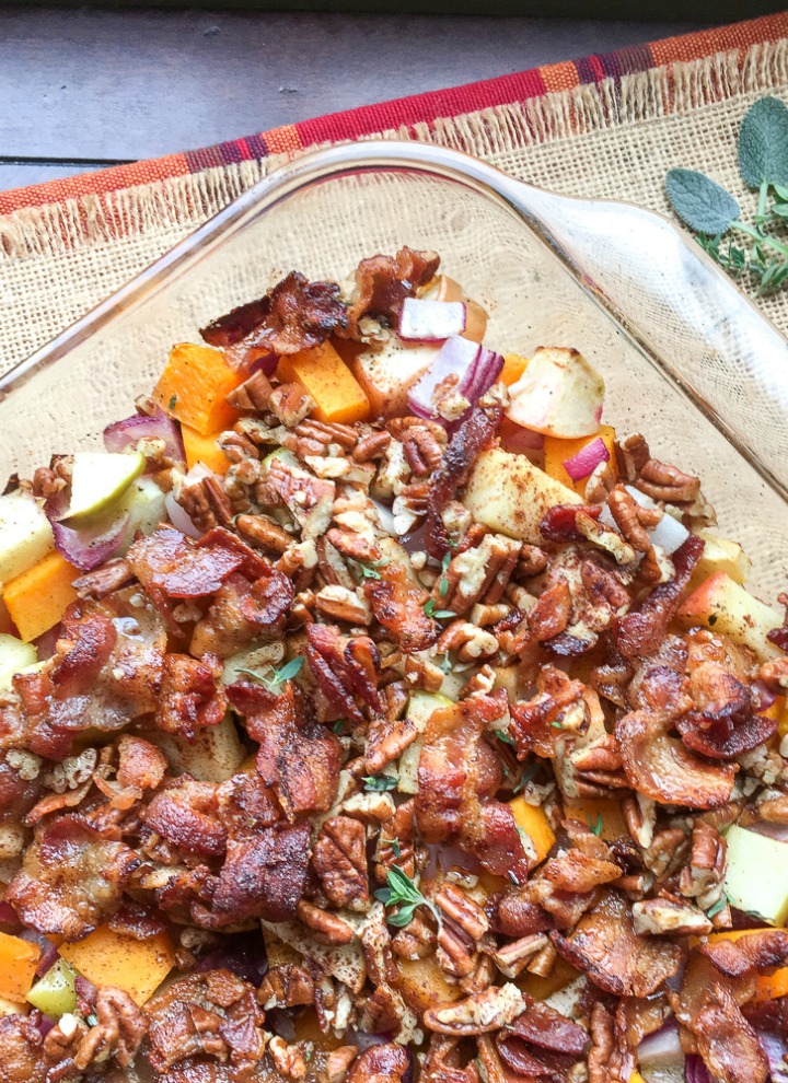 Apple Butternut Squash Casserole in baking dish on a burlap mat